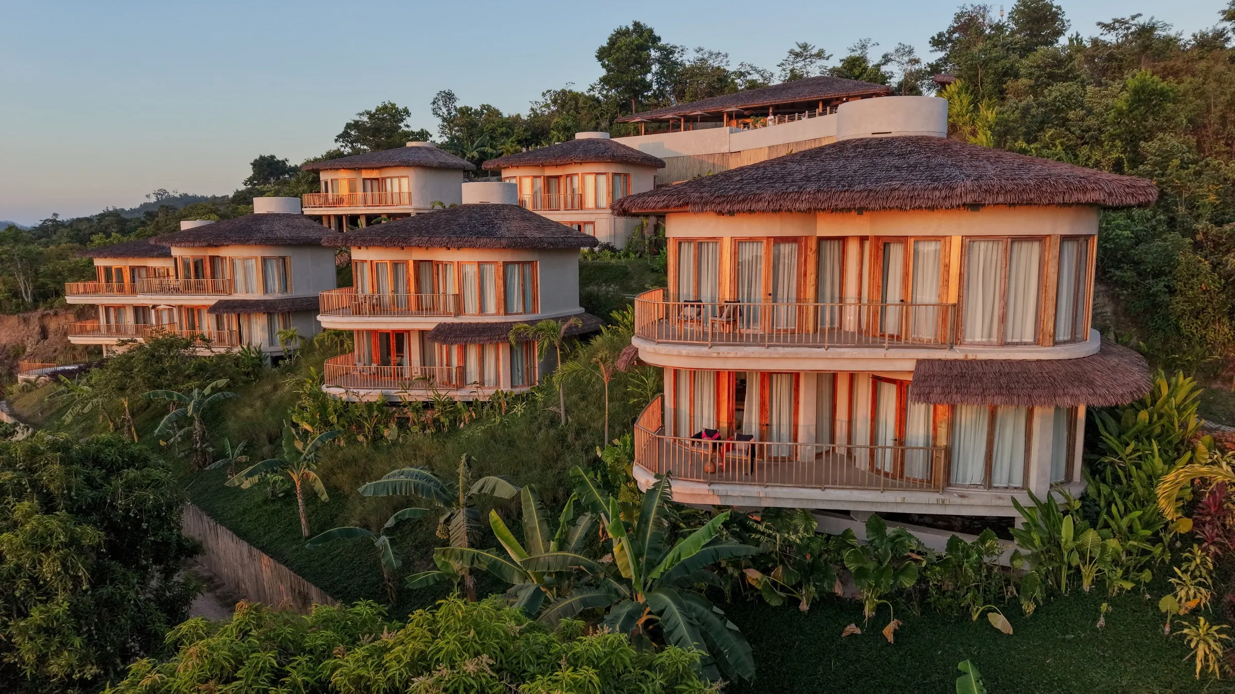 Atalaya Resort villas at dusk above El Nido